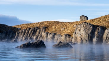 The coastline is rocky around the Sky Lagoon.